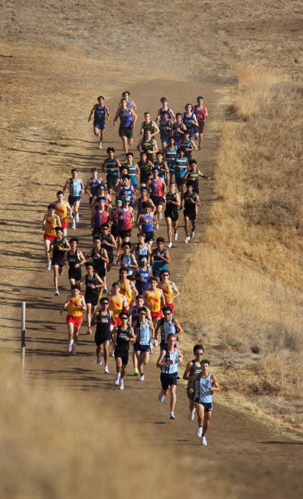 Branham cross country leading the pack at Montgomery Hill Park in the varsity boys race.